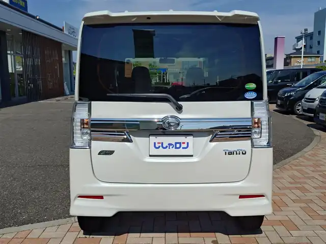 ダイハツ タント カスタム RS SA 新潟県 2014(平26)年 9.4万km パールホワイトⅢ (株)IDOMが運営する【じしゃロン新潟店】の自社ローン専用車両になります。/こちらは現金またはオートローンご利用時の価格です。自社ローンご希望の方は別途その旨お申付け下さい/社外HDDナビ/FM/AM/CD/DVD/フルセグTV視聴可能/Bluetooth接続可能/バックカメラ/ETC/両側パワースライドドア/プッシュスタート/革巻きステアリング/ダイハツ純正後席用モニター/横滑り防止装置/衝突被害軽減システム/フォグランプ/純正フロアマット/電動格納ウィンカーミラー/取扱説明書/保証書/スマートキー