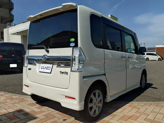 ダイハツ タント カスタム RS SA 新潟県 2014(平26)年 9.4万km パールホワイトⅢ (株)IDOMが運営する【じしゃロン新潟店】の自社ローン専用車両になります。/こちらは現金またはオートローンご利用時の価格です。自社ローンご希望の方は別途その旨お申付け下さい/社外HDDナビ/FM/AM/CD/DVD/フルセグTV視聴可能/Bluetooth接続可能/バックカメラ/ETC/両側パワースライドドア/プッシュスタート/革巻きステアリング/ダイハツ純正後席用モニター/横滑り防止装置/衝突被害軽減システム/フォグランプ/純正フロアマット/電動格納ウィンカーミラー/取扱説明書/保証書/スマートキー