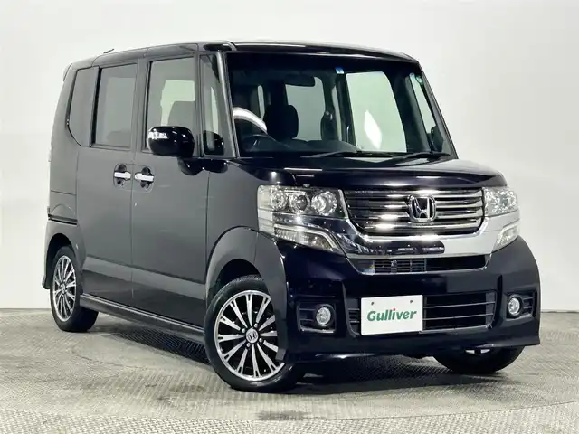 ホンダ Ｎ ＢＯＸ カスタム G ターボパッケージ 大阪府 2013(平25)年 5.5万km プレミアムゴールドパープルパール 純正ナビ（地デジ／ＤＶＤ再生）　両側パワースライドドア　バックカメラ　ＥＴＣ　クルコン　オートライト　パドルシフト　アイドリングストップ　スマートキー　プッシュスタート　オートエアコン　電格ミラー