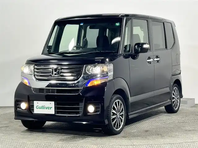 ホンダ Ｎ ＢＯＸ カスタム G ターボパッケージ 大阪府 2013(平25)年 5.5万km プレミアムゴールドパープルパール 純正ナビ（地デジ／ＤＶＤ再生）　両側パワースライドドア　バックカメラ　ＥＴＣ　クルコン　オートライト　パドルシフト　アイドリングストップ　スマートキー　プッシュスタート　オートエアコン　電格ミラー