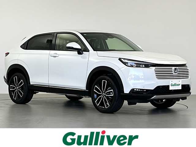 ホンダ ヴェゼル ハイブリッド e:HEV Z 岐阜県 2025(令7)年 0.1万km未満 パール 登録済未使用車/純正ディスプレイオーディオ/・ナビ/・フルセグ/・Bluetooth/・USB/バックカメラ/ホンダセンシング/ハーフレザーシート/シートヒーター/ハンドルヒーター/パワーバックドア/革巻きステアリング/パドルシフト/純正１８インチＡＷ/ビルトインETC2.0/プッシュスタート/スマートキー/LEDオートライト/フォグランプ/コーナーセンサー