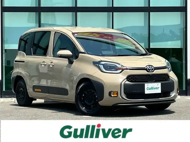 トヨタ シエンタ ハイブリッド Z 和歌山県 2024(令6)年 0.2万km ベージュ MC後モデル/10インチメーカーデイスプレーオーディオナビ/パノラミックビューカメラ/革巻きステアリング/ステアリングスイッチ/ステアリングヒーター/シートヒーター/両側パワースライドドア/LEDヘッドライト/ETC/フロアマット/100Ｖ