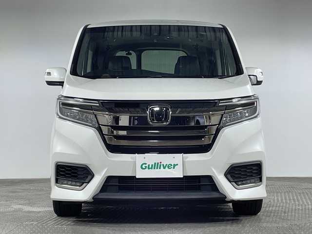 ホンダ ステップワゴン スパーダ クルスピセンシング 神奈川県 2018(平30)年 3.4万km プラチナホワイトパール 純正10型ナビ（VXV-197SWi）/純正フリップダウンモニター/バックカメラ/両側パワースライドドア/ホンダセンシング/衝突軽減ブレーキ(CMBS)/アダプティブクルーズコントロール（ACC)/車線維持支援システム/路外逸脱抑制機能/先行車発進お知らせ機能/前後ドライブレコーダー/パドルシフト/前席シートヒーター/ビルトインＥＴＣ/スマートキ/スペアキー