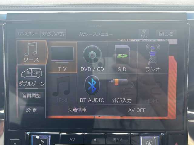 トヨタ アルファードハイブリット SR 沖縄県 2019(令1)年 6.1万km ホワイトパールクリスタルシャイン 社外９インチナビ　/（ＡＭ／ＦＭ／ＣＤ／ＤＶＤ／ＢＴ）　/バックカメラ　/フルセグＴＶ　/サンルーフ　/後席モニター　/パワーシート　/シートヒーター　/両側パワスラ　/レザーシート　/コーナーセンサー/オットマン/純正フロアマット/純正17AW/クルーズコントロール/LEDヘッドライト/オートライト/ドラレコ