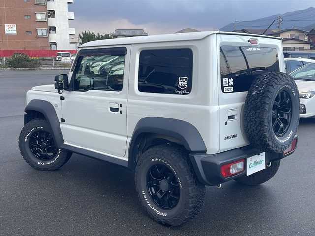 スズキ ジムニー シエラ JC 山口県 2022(令4)年 5.9万km ピュアホワイトP 9型アルパインナビ　/AM/FM/CD/DVD/フルセグTV/Bluetooth/バックカメラ　/社外アルミホイール　/給油口蓋カスタム　/セーフティーサポート　/オートクルーズコントロール　/前席シートヒーター　/レザーシートカバー　/ダウンヒルアシストコントロール　/LEDヘッドライト/オートライト、オートマチックハイビーム/純正フロアマット/スマートキー×２/ETC