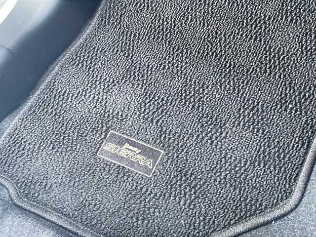 スズキ ジムニー シエラ JC 山口県 2022(令4)年 5.9万km ピュアホワイトP 9型アルパインナビ　/AM/FM/CD/DVD/フルセグTV/Bluetooth/バックカメラ　/社外アルミホイール　/給油口蓋カスタム　/セーフティーサポート　/オートクルーズコントロール　/前席シートヒーター　/レザーシートカバー　/ダウンヒルアシストコントロール　/LEDヘッドライト/オートライト、オートマチックハイビーム/純正フロアマット/スマートキー×２/ETC