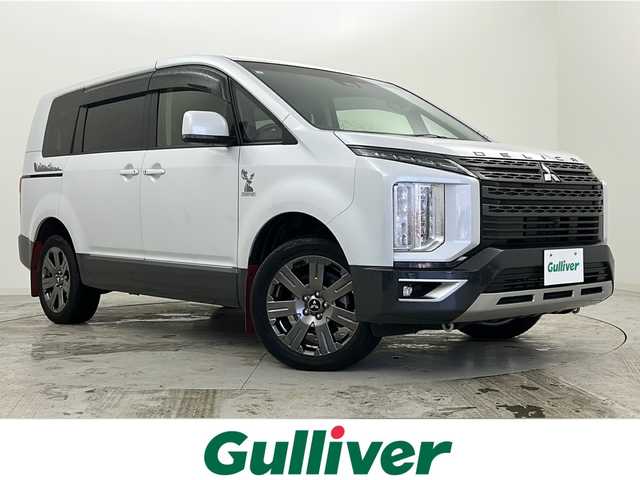 三菱 デリカＤ：５ ジャスパー 宮城県 2023(令5)年 6万km ホワイトダイヤモントド/グラファイトグレーメタリック 禁煙車/ワンオーナー/サイドオートステップ/マルチビューモニター/ALPINE製フリップダウンモニター/BIGX11インチナビ/・CD.DVD.SD.BT.USB/フルセグTV/三菱e-Assist/・衝突軽減ブレーキ/・車線逸脱警報/・アダプティブクルーズコントロール/・オートハイビームアシスト/・ブラインドスポットモニター/両側パワースライドドア/パワーバックドア/ハーフレザーシート/・D席パワーシート/・前席シートヒーター/電動パーキングブレーキ/オートホールド機能/LEDヘッドライト/LEDフォグランプ/パドルシフト/ビルトインETC/ステアリングヒーター/ステアリングスイッチ/プッシュスタート/スマートキー/純正18インチアルミホイール/純正フロアマット