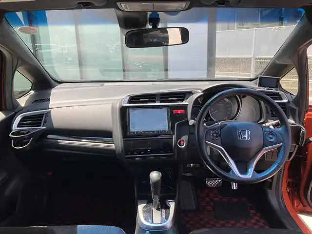 ホンダ フィット RS 香川県 2014(平26)年 12.4万km サンセットオレンジⅡ 登録時走行距離：123166km/ディーラー純正8型ナビ/　CD DVD BT フルセグTV/バックカメラ/シティブレーキアシスト/クルーズコントロール/パドルシフト/LEDヘッドライト/オートライト/フォグランプ/アイドリングストップ/横滑り防止装置/ETC/革巻きステアリング/ステアリングスイッチ/プッシュスタート/スマートキー/スペアキー