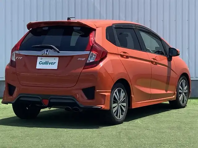 ホンダ フィット RS 香川県 2014(平26)年 12.4万km サンセットオレンジⅡ 登録時走行距離：123166km/ディーラー純正8型ナビ/　CD DVD BT フルセグTV/バックカメラ/シティブレーキアシスト/クルーズコントロール/パドルシフト/LEDヘッドライト/オートライト/フォグランプ/アイドリングストップ/横滑り防止装置/ETC/革巻きステアリング/ステアリングスイッチ/プッシュスタート/スマートキー/スペアキー
