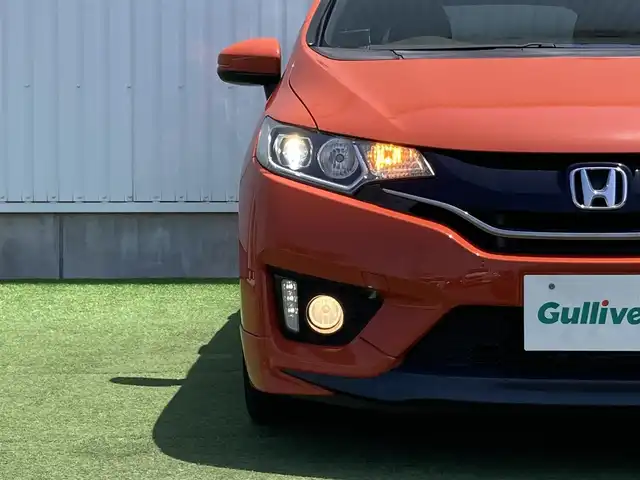 ホンダ フィット RS 香川県 2014(平26)年 12.4万km サンセットオレンジⅡ 登録時走行距離：123166km/ディーラー純正8型ナビ/　CD DVD BT フルセグTV/バックカメラ/シティブレーキアシスト/クルーズコントロール/パドルシフト/LEDヘッドライト/オートライト/フォグランプ/アイドリングストップ/横滑り防止装置/ETC/革巻きステアリング/ステアリングスイッチ/プッシュスタート/スマートキー/スペアキー