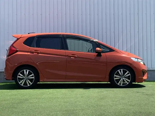 ホンダ フィット RS 香川県 2014(平26)年 12.4万km サンセットオレンジⅡ 登録時走行距離：123166km/ディーラー純正8型ナビ/　CD DVD BT フルセグTV/バックカメラ/シティブレーキアシスト/クルーズコントロール/パドルシフト/LEDヘッドライト/オートライト/フォグランプ/アイドリングストップ/横滑り防止装置/ETC/革巻きステアリング/ステアリングスイッチ/プッシュスタート/スマートキー/スペアキー