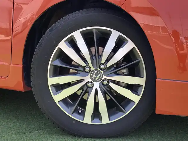 ホンダ フィット RS 香川県 2014(平26)年 12.4万km サンセットオレンジⅡ 登録時走行距離：123166km/ディーラー純正8型ナビ/　CD DVD BT フルセグTV/バックカメラ/シティブレーキアシスト/クルーズコントロール/パドルシフト/LEDヘッドライト/オートライト/フォグランプ/アイドリングストップ/横滑り防止装置/ETC/革巻きステアリング/ステアリングスイッチ/プッシュスタート/スマートキー/スペアキー