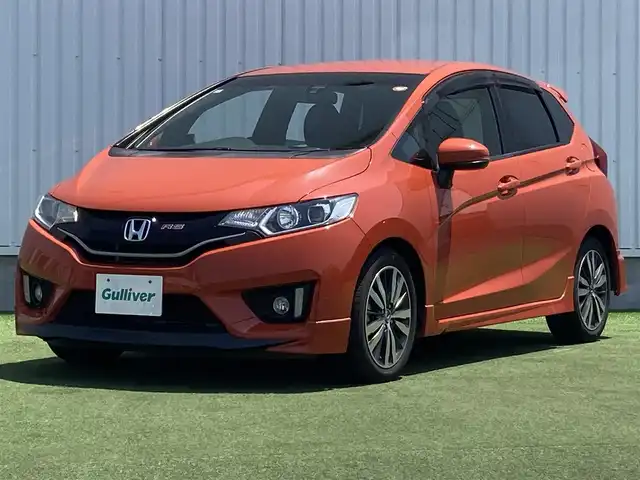ホンダ フィット RS 香川県 2014(平26)年 12.4万km サンセットオレンジⅡ 登録時走行距離：123166km/ディーラー純正8型ナビ/　CD DVD BT フルセグTV/バックカメラ/シティブレーキアシスト/クルーズコントロール/パドルシフト/LEDヘッドライト/オートライト/フォグランプ/アイドリングストップ/横滑り防止装置/ETC/革巻きステアリング/ステアリングスイッチ/プッシュスタート/スマートキー/スペアキー