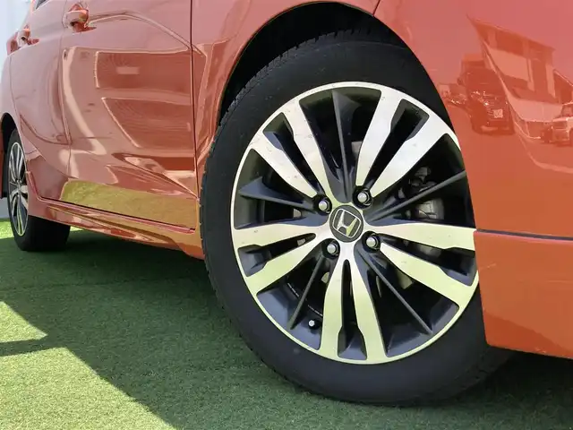ホンダ フィット RS 香川県 2014(平26)年 12.4万km サンセットオレンジⅡ 登録時走行距離：123166km/ディーラー純正8型ナビ/　CD DVD BT フルセグTV/バックカメラ/シティブレーキアシスト/クルーズコントロール/パドルシフト/LEDヘッドライト/オートライト/フォグランプ/アイドリングストップ/横滑り防止装置/ETC/革巻きステアリング/ステアリングスイッチ/プッシュスタート/スマートキー/スペアキー