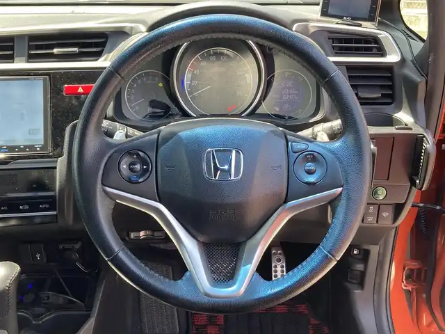 ホンダ フィット RS 香川県 2014(平26)年 12.4万km サンセットオレンジⅡ 登録時走行距離：123166km/ディーラー純正8型ナビ/　CD DVD BT フルセグTV/バックカメラ/シティブレーキアシスト/クルーズコントロール/パドルシフト/LEDヘッドライト/オートライト/フォグランプ/アイドリングストップ/横滑り防止装置/ETC/革巻きステアリング/ステアリングスイッチ/プッシュスタート/スマートキー/スペアキー