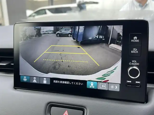 ホンダ ヴェゼル ハイブリッド e:HEV Z 滋賀県 2025(令7)年 0.1千km プラチナホワイトパール 登録済未使用車/純正９インチナビ/(Bluetooth/フルセグTV/USB)/パワーバックドア/レーダークルーズコントロール/バックカメラ/ブラインドスポットモニター/クリアランスソナー/ETC2.0/ワイヤレス充電/ステアリングヒーター/シートヒーター/純正１８インチアルミホイール/オートライト/オートハイビーム/LEDヘッドライト/スペアキー