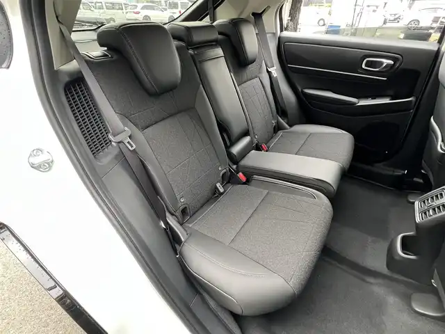 ホンダ ヴェゼル ハイブリッド e:HEV Z 滋賀県 2025(令7)年 0.1千km プラチナホワイトパール 登録済未使用車/純正９インチナビ/(Bluetooth/フルセグTV/USB)/パワーバックドア/レーダークルーズコントロール/バックカメラ/ブラインドスポットモニター/クリアランスソナー/ETC2.0/ワイヤレス充電/ステアリングヒーター/シートヒーター/純正１８インチアルミホイール/オートライト/オートハイビーム/LEDヘッドライト/スペアキー