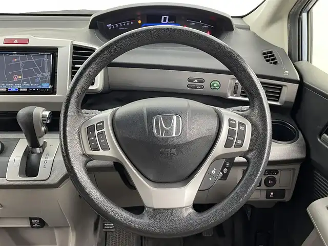 ホンダ フリード ハイブリット ジャストセレクション 大分県 2013(平25)年 8万km プレミアムブルーオパールメタリック 社外メモリーナビ/（フルセグ/CD/DVD/Bluetooth）/バックカメラ/両側パワースライドドア/HIDヘッドライト/クルーズコントロール/前後ドライブレコーダー/ステアリングスイッチ/オートエアコン/ビルトインETC/電動格納ミラー/保証書・取扱説明書/スマートキー