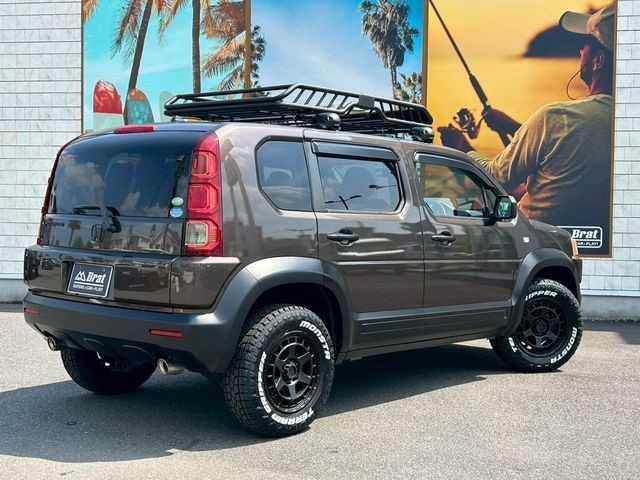 ホンダ クロスロード 18L HDDナビエディション 宮崎県 2009(平21)年 7.9万km 茶 AIS検査済み/【2501048980】社外パーツ取付有/全塗装（グラファイトメタリック）/純正HDDナビ/バックカメラ/HIDヘッドライト/キーレスキー/純正フロアマット/クリアサイドマーカー（社外）/WEDS　マッドヴァンスX タイプS（社外）/モンスタ　テレーングリッパー（社外）/リフトアップキット（社外）/アルミ製ルーフラック（社外）/イノー　ベースキャリア（社外）