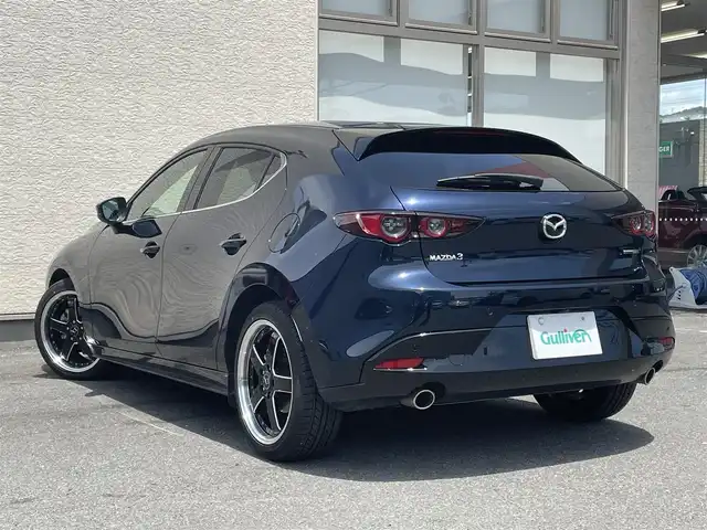 マツダ マツダ３ファストバック 15S ツーリング 大阪府 2019(令1)年 1.6万km ディープクリスタルブルーマイカ ワンオーナー/8.8インチ純正SDナビ/（フルセグ/BT/CD/DVD）/全方位カメラ/プリクラッシュセーフティー/BSM/横滑り防止システム/ヘッドアップディスプレイ/レーダーモニター/クルーズコントロール/（追従有）/前後コーナーセンサー/社外ホイール/（VALENTINA）/ETC/保証書/取扱説明書/スペアキー　有