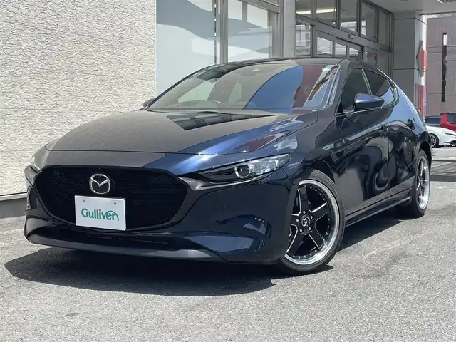 マツダ マツダ３ファストバック 15S ツーリング 大阪府 2019(令1)年 1.6万km ディープクリスタルブルーマイカ ワンオーナー/8.8インチ純正SDナビ/（フルセグ/BT/CD/DVD）/全方位カメラ/プリクラッシュセーフティー/BSM/横滑り防止システム/ヘッドアップディスプレイ/レーダーモニター/クルーズコントロール/（追従有）/前後コーナーセンサー/社外ホイール/（VALENTINA）/ETC/保証書/取扱説明書/スペアキー　有
