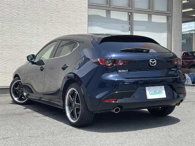 マツダ マツダ３ファストバック 15S ツーリング 大阪府 2019(令1)年 1.6万km ディープクリスタルブルーマイカ ワンオーナー/純正SDナビ8.8インチ/（フルセグ/BT/CD/DVD）/全方位カメラ/プリクラッシュセーフティー/BSM/横滑り防止システム/ヘッドアップディスプレイ/レーダーモニター/クルーズコントロール/（追従有）/前後コーナーセンサー/社外ホイール/（VALENTINA）/ETC/保証書/取扱説明書/スペアキー　有
