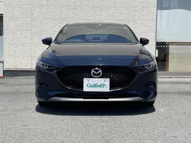 マツダ マツダ３ファストバック 15S ツーリング 大阪府 2019(令1)年 1.6万km ディープクリスタルブルーマイカ ワンオーナー/純正SDナビ8.8インチ/（フルセグ/BT/CD/DVD）/全方位カメラ/プリクラッシュセーフティー/BSM/横滑り防止システム/ヘッドアップディスプレイ/レーダーモニター/クルーズコントロール/（追従有）/前後コーナーセンサー/社外ホイール/（VALENTINA）/ETC/保証書/取扱説明書/スペアキー　有