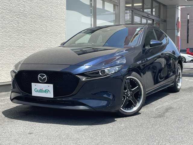 マツダ マツダ３ファストバック 15S ツーリング 大阪府 2019(令1)年 1.6万km ディープクリスタルブルーマイカ ワンオーナー/純正SDナビ8.8インチ/（フルセグ/BT/CD/DVD）/全方位カメラ/プリクラッシュセーフティー/BSM/横滑り防止システム/ヘッドアップディスプレイ/レーダーモニター/クルーズコントロール/（追従有）/前後コーナーセンサー/社外ホイール/（VALENTINA）/ETC/保証書/取扱説明書/スペアキー　有