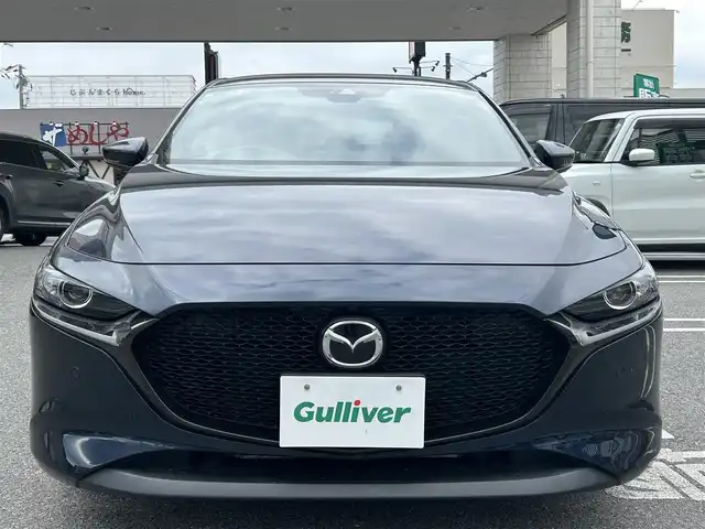 マツダ マツダ３ファストバック 15S ツーリング 奈良県 2019(令1)年 1.6万km ディープクリスタルブルーマイカ ワンオーナー/純正SDナビ8.8インチ/（フルセグ/BT/CD/DVD）/全方位カメラ/プリクラッシュセーフティー/BSM/横滑り防止システム/ヘッドアップディスプレイ/レーダーモニター/クルーズコントロール/（追従有）/前後コーナーセンサー/社外ホイール/（VALENTINA）/ETC/保証書/取扱説明書/スペアキー　有