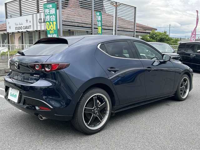 マツダ マツダ３ファストバック 15S ツーリング 奈良県 2019(令1)年 1.6万km ディープクリスタルブルーマイカ ワンオーナー/純正SDナビ8.8インチ/（フルセグ/BT/CD/DVD）/全方位カメラ/プリクラッシュセーフティー/BSM/横滑り防止システム/ヘッドアップディスプレイ/レーダーモニター/クルーズコントロール/（追従有）/前後コーナーセンサー/社外ホイール/（VALENTINA）/ETC/保証書/取扱説明書/スペアキー　有