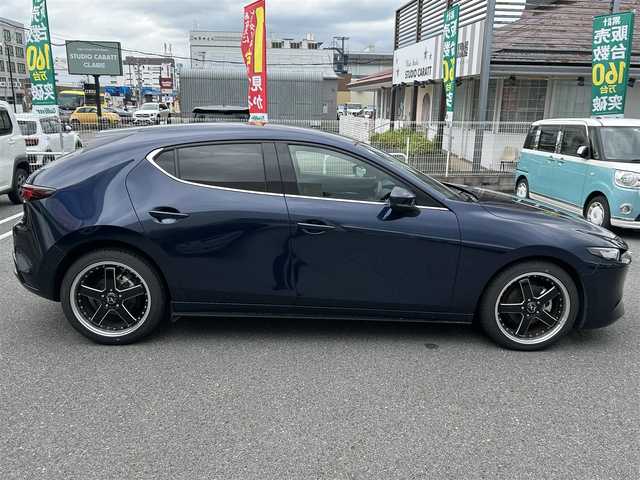 マツダ マツダ３ファストバック 15S ツーリング 奈良県 2019(令1)年 1.6万km ディープクリスタルブルーマイカ ワンオーナー/純正SDナビ8.8インチ/（フルセグ/BT/CD/DVD）/全方位カメラ/プリクラッシュセーフティー/BSM/横滑り防止システム/ヘッドアップディスプレイ/レーダーモニター/クルーズコントロール/（追従有）/前後コーナーセンサー/社外ホイール/（VALENTINA）/ETC/保証書/取扱説明書/スペアキー　有