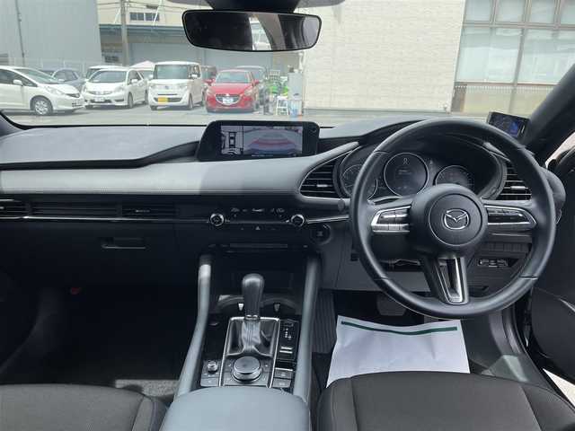 マツダ マツダ３ファストバック 15S ツーリング 奈良県 2019(令1)年 1.6万km ディープクリスタルブルーマイカ ワンオーナー/純正SDナビ8.8インチ/（フルセグ/BT/CD/DVD）/全方位カメラ/プリクラッシュセーフティー/BSM/横滑り防止システム/ヘッドアップディスプレイ/レーダーモニター/クルーズコントロール/（追従有）/前後コーナーセンサー/社外ホイール/（VALENTINA）/ETC/保証書/取扱説明書/スペアキー　有