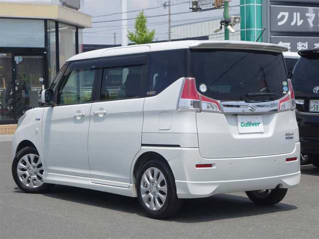 スズキ ソリオ HV MX 静岡県 2018(平30)年 6万km ピュアホワイトP ワンオーナー／禁煙車/セーフティサポート/　・ディアルカメラブレーキサポート/　・後退時ブレーキサポート/　・誤発進抑制機能/　・車線逸脱警報機能/　・ふらつき警報機能/　・先行車発進のお知らせ機能/　・ハイビームアシスト/　・アダクティブクルーズコントロール/　・パーキングセンサー/純正ナビ（Panasonic CN-R2743W）/　CD/DVD/SD/USB/BT/フルセグTV/Memory music/全方位カメラ/ビルトインETC/純正前方ドライブレコーダー/ステアリングスイッチ/運転席シートヒーター/プッシュスタート／スマートキー/HIDヘッドライト（LEDポジションランプ付）/純正フロアマット／ドアバイザー/取扱説明書／保証書