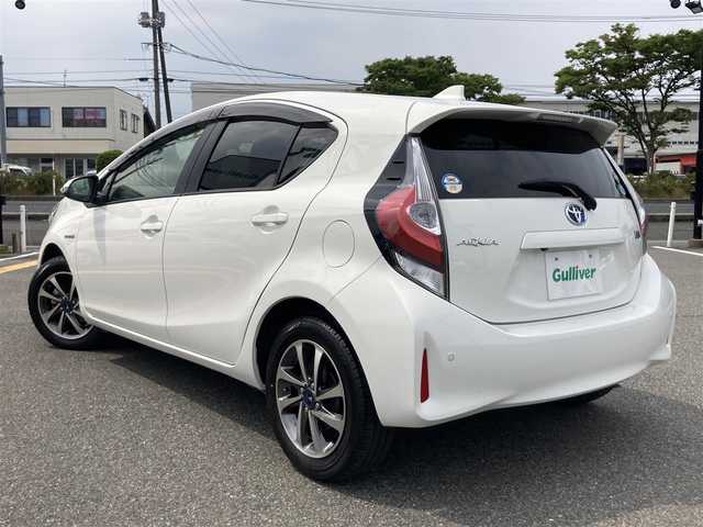 トヨタ アクア S 鳥取県 2017(平29)年 3.5万km ライムホワイトパールクリスタルシャイン 純正9インチナビ/フルセグ/DVD/CD/BT/バックカメラ/ビルトインETC/トヨタセーフティセンス/レーンキープアシスト/前後コーナーセンサー/オートハイビーム/モデリスタ15インチアルミホイール/プッシュエンジンスタート/ステアリングスイッチ/スマートキー×２/純正フロアマット/ドアバイザー