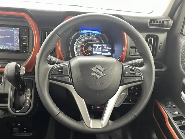 スズキ ハスラー HYBRID X 熊本県 2023(令5)年 2万km バーミリオンオレンジ/ガンメタリック2トーン 禁煙車　/純正OPタフスタイルデカールセット/純正OPインパネガーニッシュセット/純正OPドアトリムガーニッシュ/社外ナビ（ＣＤ・ＤＶＤ・フルセグ・ＢＴ・ＳＤ・ＵＳＢ）/バックカメラ　/純正前後ドライブレコーダー　/ビルトインＥＴＣ　/後ろのみクリアランスソナー　/前席シートヒーター　/スズキセーフティサポート/・デュアルセンサーブレーキサポート/・誤発進制御機能/・後退時ブレーキサポート/・後側誤発進抑制/・車線逸脱抑制機能/・車線逸脱警報機能/・ふらつき警報機能/・先行車発進お知らせ機能/・標識認識システム/・レーダークルーズコントロール　/横滑り防止/アイドリングストップ/純正フロアマット/純正１５インチAW/オートライト/LEDヘッドライト/フォグランプ/スマートキー/プッシュスタート/取扱説明書