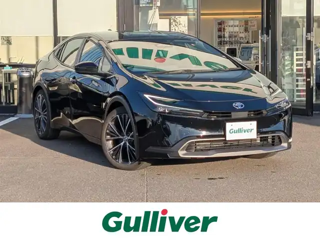 トヨタ プリウス G 福井県 2024(令6)年 2.9万km アティチュードブラックマイカ 純正メモリナビ/AM/FM/フルセグ/BT/USB/Miracast/バックカメラ/全車速追従機能付クルーズコントロール/コーナーセンサー/BSM/衝突被害軽減システム/パーキングアシスト/レーンキープアシスト/横滑り防止装置/盗難防止装置/ビルトインETC2.0/シートヒーター/１００V充電/SOSボタン/純正フロアマット/LEDヘッドライト/オートホールド/純正19インチAW/スマートキー