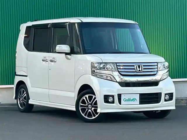 ホンダ Ｎ ＢＯＸ カスタム G SSパッケージ 宮城県 2014(平26)年 7.5万km プレミアムホワイトパール 純正7インチナビ/(ワンセグTV/CD/DVD/SD/BT)/バックカメラ/両側パワースライドドア/オートエアコン/革巻きステアリング/ステアリングスイッチ/ドライブセレクト/ふらつき防止/プッシュスタート＆スマートキ/ウインカー付き電動格納ミラー/ドアバイザー/LEDヘッドライト/フォグランプ/純正フロアマット/純正14インチAW