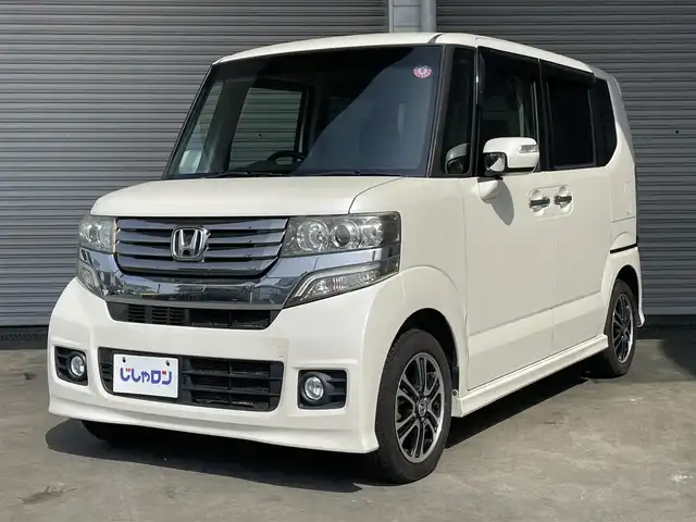 ホンダ Ｎ ＢＯＸ カスタム G SSパッケージ 茨城県 2014(平26)年 7.5万km プレミアムホワイトパール (株)IDOMが運営する【じしゃロン水戸店】の自社ローン専用車両になりますこちらは現金またはオートローンご利用時の価格です。自社ローンご希望の方は別途その旨お申付け下さい/純正7インチナビ/-ワンセグTV CD DVD SD BT-/バックカメラ/両側パワースライドドア/ステアリングスイッチ/プッシュスタート＆スマートキ