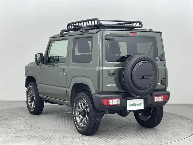 スズキ ジムニー XC 道央・札幌 2024(令6)年 2万km ジャングルグリーン ・４WD/・オープンカントリーホワイトレタータイヤ/・ルーフキャリア/・社外ナビ/・フルセグ/・ETC/・衝突軽減ブレーキ/・クルーズコントロール/・レーンキープアシスト/・前席シートヒーター/・アイドリングストップ/・ダウンヒルアシストコントロール/・LEDヘッドライト/・ヘッドライトウォッシャー/・純正フロアマット/・純正16インチAW