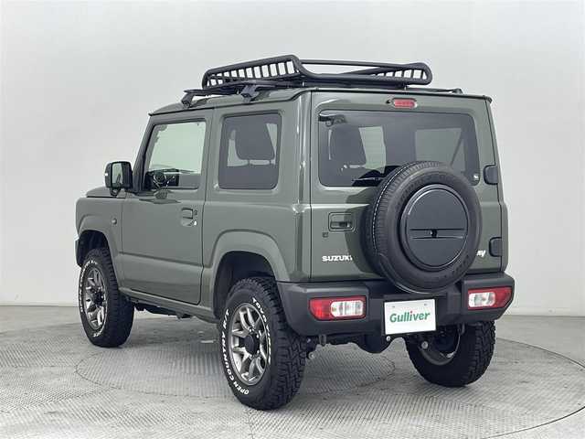 スズキ ジムニー XC 道央・札幌 2024(令6)年 2万km ジャングルグリーン ・４WD/・オープンカントリーホワイトレタータイヤ/・ルーフキャリア/・社外ナビ/・フルセグ/・ETC/・衝突軽減ブレーキ/・クルーズコントロール/・レーンキープアシスト/・前席シートヒーター/・アイドリングストップ/・ダウンヒルアシストコントロール/・LEDヘッドライト/・ヘッドライトウォッシャー/・純正フロアマット/・純正16インチAW