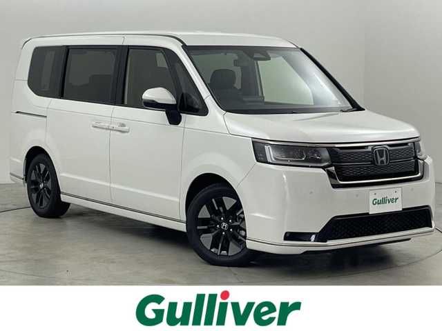 ホンダ ステップワゴン スパーダ eHEV 福岡県 2025(令7)年 0.1千km プラチナムホワイトパール 登録済未使用車　/純正１１．４型ナビ/フルセグTV　/バックカメラ　/アダプティブクルーズコントロール　/コーナーセンサー　/衝突軽減ブレーキ　/レーンキープ　/ブラインドスポットモニター　/アクセル踏み間違い防止　/パドルシフト　/両側電動スライドドア　/パワーバックドア　/ハーフレザーシート　/シートヒーター　/Wエアコン　/純正１６インチアルミホイール