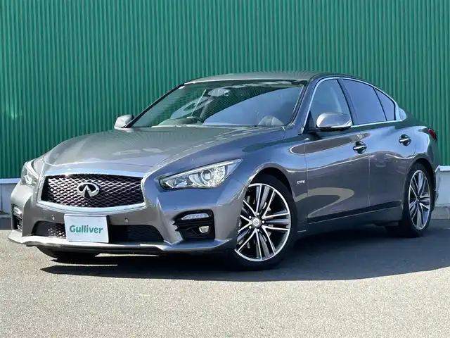日産 スカイライン ハイブリッド 350GT Type SP 宮城県 2014(平26)年 6.7万km ダークメタルグレー 全方位運転支援システム/・車線逸脱防止支援システム/車線逸脱警報/・後側方衝突防止支援システム/後側方車両検知警報/・後退時衝突防止支援システム/・前方衝突予測警報/・エマージェンシーブレーキ/・インテリジェントクルーズコントロール/・インテリジェントペダル/・アラウンドビューモニター/・コーナーセンサー/ダイレクトアクティブステアリング/アクティブレーンコントロール/純正ナビ地図SD未到着・要確認/(フルセグTV/CD/DVD/BT/USB/AUX)/本革シート/パワーシート(D＋N席)/シートヒーター(D＋N席)/オートエアコン/MTモード付AT/ドライブセレクト/革巻きステアリング/ステアリングスイッチ/パドルシフト/ふらつき防止/オートライト/プッシュスタート＆スマートキー/ウインカー付き電動格納ミラー/純正フロアマット/LEDヘッドライト/フォグランプ/純正19インチAW