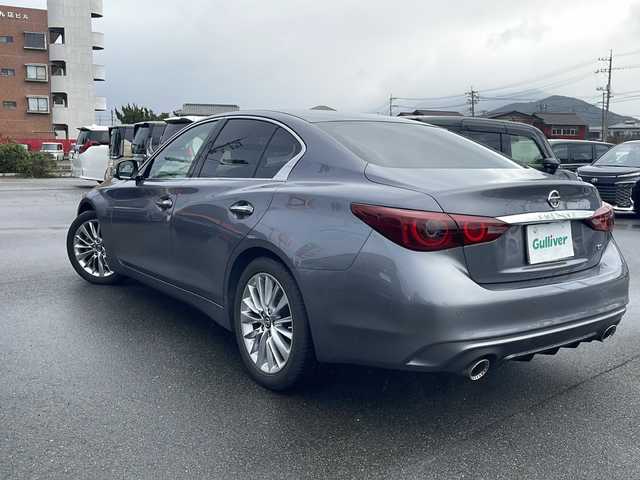 日産 スカイライン GT タイプP 山口県 2021(令3)年 3.6万km ダークメタルグレー 純正8型ナビ（フルセグTV、AM/FM、Bluetooth）/全方位カメラ/レーダークルーズコントロール/LEDオートライト/レザーシート/前席シートヒーター＆パワーシート/シートメモリー/純正18インチアルミホイール/前後コーナーセンサー/ターボ車/横滑り防止装置/レーンキープアシスト/衝突被害軽減ブレーキ