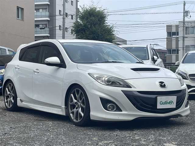 マツダ アクセラ スポーツ マツダスピード 東京都 2011(平23)年 5.8万km クリスタルホワイトパールマイカ ターボ/6MT/社外HDDナビ【ALPINE】/ (フルセグTV/DVD/SD/USB)/ETC2.0/BOSEサウンドシステム/ハーフレザーシート/D席メモリ機能付きパワーシート/横滑り防止装置/純正18インチアルミホイール/オートライト/純正HIDヘッドライト/スマートキー/カーテンエアバック
