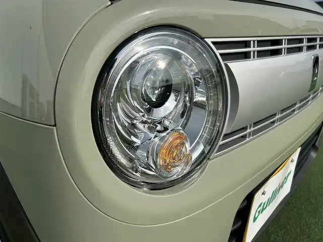 スズキ ラパン L 香川県 2025(令7)年 0.5万km トラッドカーキメタリック 登録時走行距離：4976km/シートヒーター/デュアルカメラブレーキサポート　/クリアランスソナー　/ステアリングリモコン　/オートライト　/純正フロアマット　/アイドリングストップ　/横滑り防止防止　/レーンキープアシスト　/スマートキー　/スペアキー