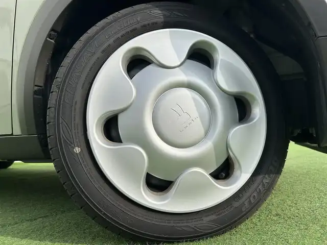 スズキ ラパン L 香川県 2025(令7)年 0.5万km トラッドカーキメタリック 登録時走行距離：4976km/シートヒーター/デュアルカメラブレーキサポート　/クリアランスソナー　/ステアリングリモコン　/オートライト　/純正フロアマット　/アイドリングストップ　/横滑り防止防止　/レーンキープアシスト　/スマートキー　/スペアキー