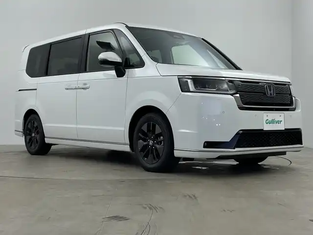 ホンダ ステップワゴン スパーダ eHEV 鹿児島県 2025(令7)年 0.1千km プラチナホワイトパール 登録済未使用車/純正11.4インチナビ/フルセグTV/バックカメラ/両側パワースライドドア/パワーバックドア/パドルシフト/ハーフレザーシート/シートヒーター/ホンダセンシング/衝突軽減ブレーキ/路外逸脱抑制機能/アダプティブクルーズコントロール/ブラインドスポットモニター/コーナーセンサー/LEDヘッドライト/オートハイビーム/スマートキー