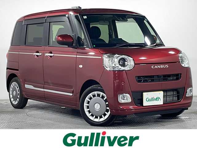 ダイハツ ムーヴ キャンバス セオリー G ターボ 広島県 2024(令6)年 0.8万km ファイアークォーツレッドM シートヒーター(運転席/助手席)/両側パワースライドドア/レーダークルーズコントロール/衝突被害軽減システム/オートマチックハイビーム/レーンキープアシスト/踏み間違い防止/フォグランプ/コーナーセンサー/エアバッグ(運転席/助手席/サイド/カーテン)/純正14インチホイールキャプ(155/65/R14)