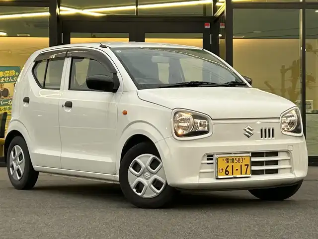 スズキ アルト F 愛媛県 2021(令3)年 2.2万km スペリアホワイト ワンオーナー　/キーレス　/純正ＣＤ　ＡＵＸ　/カメラ一体型ドライブレコーダー　/オートライト　/光軸レベライザー　/前席パワーウインドウ　/５速マニュアル　/純正フロアマット　/純正ドアバイザー　/保証書　/取扱説明書/ドライブレコーダー取扱説明書
