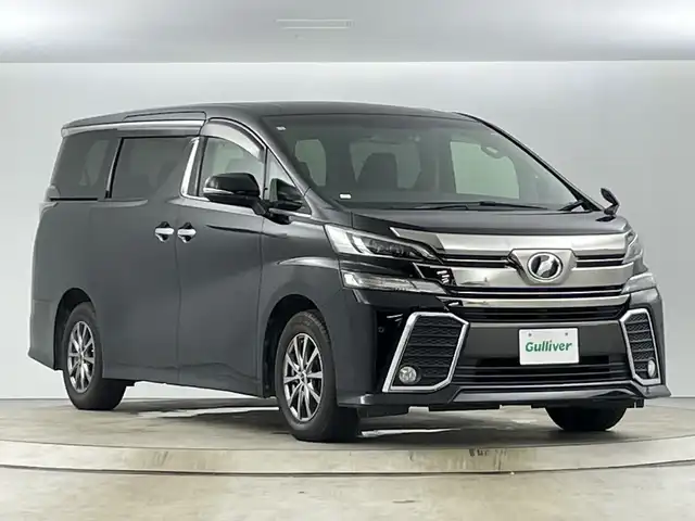 トヨタ ヴェルファイア Z 愛知県 2016(平28)年 7.9万km ブラック ワンオーナー/ALPINEビッグX11インチSDナビ【EX11V】/（CD/DVD/MSV/Bluetooth/フルセグTV）/ALPINEフリップダウンモニター【PXH12X-R-AV】/両後パワースライドドア/スマートキー/前後コーナーセンサー/バックドアイージークローザー/LEDヘッドライト/フォグランプ/社外ドライブレコーダー【DRV-610】/ETC/社外16インチアルミホイール/本革巻きステアリング/リアスポイラー/ドアバイザー/サイド＆カーテンエアバッグ/取扱説明書